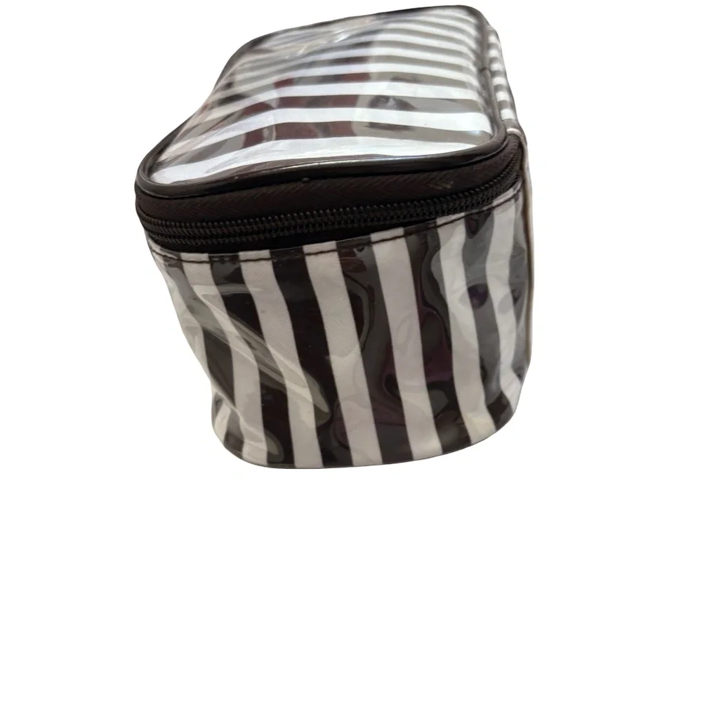 Henri bendel white & brown striped cosmeti case bag.